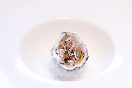 Oyster with grapefruit, onion, chili & chives # 61