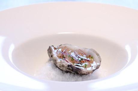 Oyster with grapefruit, onion, chili & chives # 61