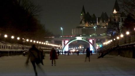 Skating on the Rideau Canal at nighttime - Ottawa - Canada