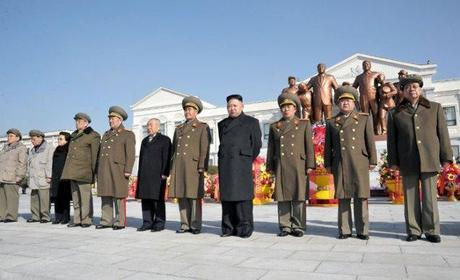 Kim Jong Un (4th R)  and members of the central leadership stand in front of statues of Kim Il Sung and Kim Jong Il during an unveiling ceremony on the campus of Mangyo'ngdae School on 16 February 2013.  Among those in attendance in this image are: Gen. O Kuk Ryol (L), VMar Ri Yong Mu (2nd L) Kim Kyong Hui (3rd L), Kim Ki Nam (4th L), Choe Yong Rim (6th L), VMar Choe Ryong Hae (2nd R) and Jang Song Taek (R) (Photo: Rodong Sinmun)