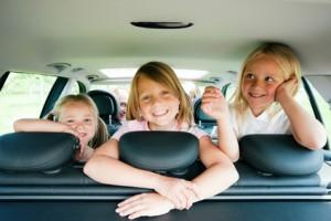 blonde kids in eco car