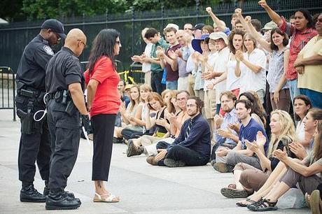 Debra White Plume being arrested at the White House in 2011