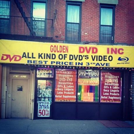 Seems impossible for a sign with so many mistakes not to have been made on purpose.  (at Golden DVD Inc)