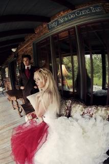 bride and groom with red accents