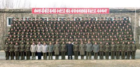 Kim Jong Un poses with service members and officers of the 4th Battalion of KPA Unit #323 (Photo: Rodong Sinmun)