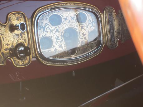 A Wide Brim Hat and a Antique Car on a Crisp Fall Day