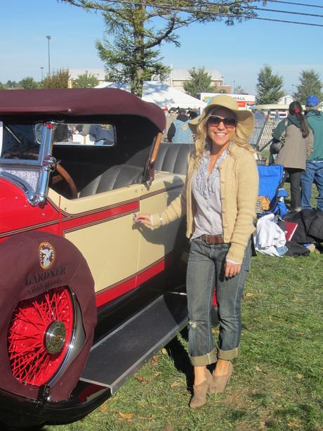 A Wide Brim Hat and a Antique Car on a Crisp Fall Day