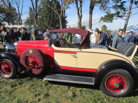 A Wide Brim Hat and a Antique Car on a Crisp Fall Day