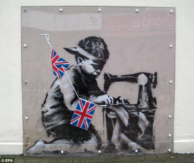 Not for sale: A Banksy mural which was ripped from the wall of a north London shop has been withdrawn from an auction in Miami