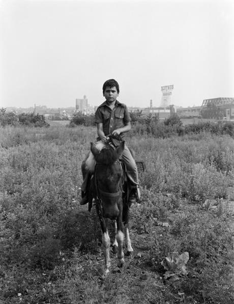 “The Puerto Ricans kept horses in the fields where there’s a Superfund site. It was very nice. It used to be overgrown with grass. There were two or three ponies, and a horse. The city cracked down eventually. People could do stuff before the city got wise.”
—Peter Bellamy on taking photographs in Brooklyn in the 1970s