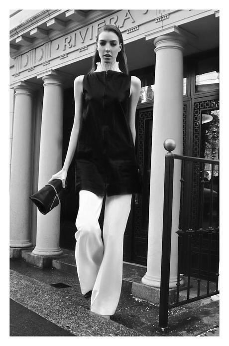 White top, Pleats Please by Issey Miyake Black Leather Tunic Vest, Peter Hidalgo White Trouser,  Chloé