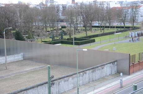 A preserved part of the 'death strip' on the left, and the Memorial and Parish Cemetery on the right