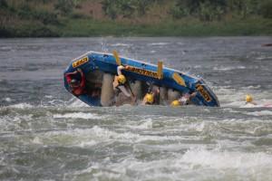 White-water rafting in Jinja Uganda on the Nile river with Adrift - tipping during ‘Vengeance’