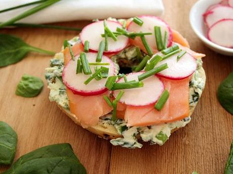 Veggie and Herb Cream Cheese on Everything Bagel, Topped with Smoked Salmon, Radish, and Chives