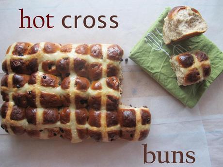 A loaf of hot cross buns, two rippled off