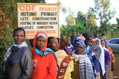 Kenyan citizens line up to cast their ballots in today's election. (Photo: Voice of America)