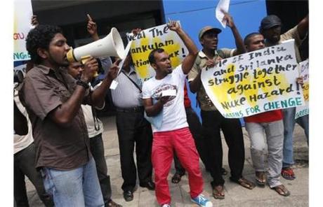Dozens of protesters from Greens for Chenge, an environmental protection group, shout slogans during a protest opposite the Indian embassy in Colombo, Sri Lanka, Tuesday, March 5, 2013. The protestors were demanding a halt to the Russian-built Kudankulam nuclear power plant being built in southern India.