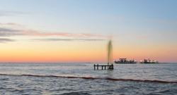 A “small” spray of crude gushes into the Gulf after a boat crashed into a wellhead.