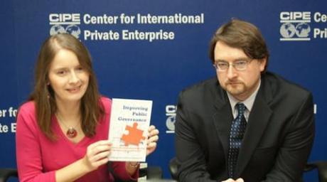 Anna Nadgrodkiewicz and Marko Tomicic present the Implementation Gap handbook.