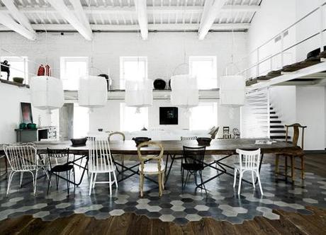 Paloa Navone designed living-dining room with chairs.