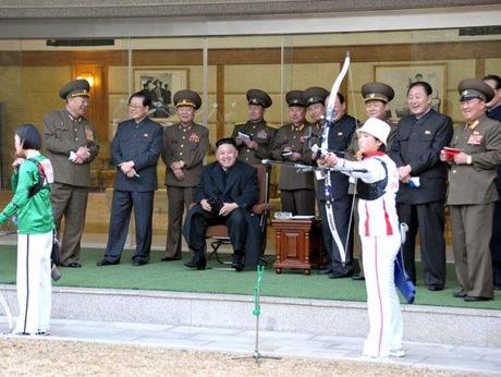 Kim Jong Un (4th L, seated) watches a woman's archery competition between archers of the 25 April Sports Team and the Amnokgang Sports Team.  Also in attendance are Gen. Hyon Yong Chol (L), Jang Song Taek (2nd L), VMar Choe Ryong Hae (3rd L) (Photo: Rodong Sinmun)