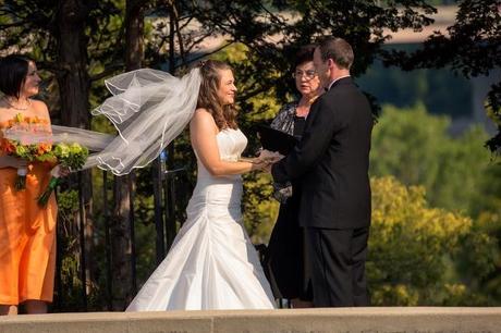 wedding ceremony bride's veil blows in wind