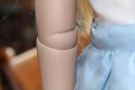 Dolly Review: A Girl For All Time Amelia Amelia's elbow joint
