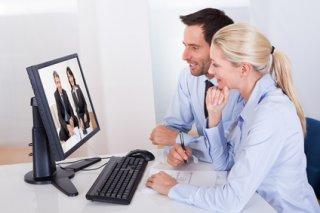 Couple watching an online presentation