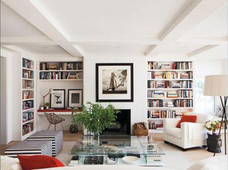 elle decor nantucket retreat elle decor white living room built in book shelves striped ottomans