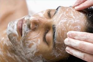 man getting his face cleansed.