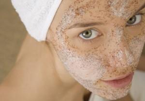girl with scrub on her face