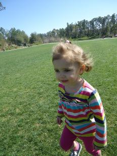 My own wild girl, running, after we read in the park and took a boat ride, but before we had our picnic in the grass.