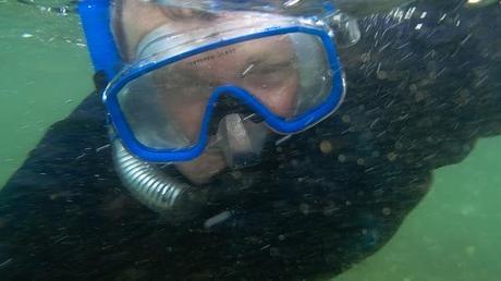 swimming underwater with snorkel