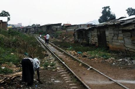 A typical scene along the railway through Namuwongo slums, Kampala slums