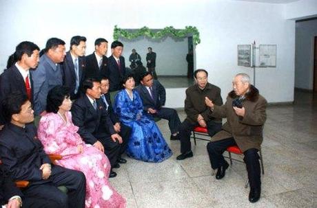 DPRK Premier Choe Yong Rim (R) talks with light industry workers participating in a national meeting, whilst visiting their Pyongyang accommodations (Photo: Rodong Sinmun)