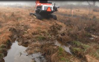 Excavator tracks flat jurisdictional wetlands