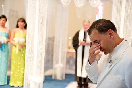 nervous groom waits for bride