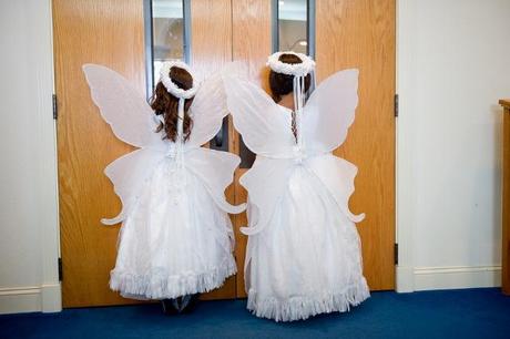 flower girls in angel costumes