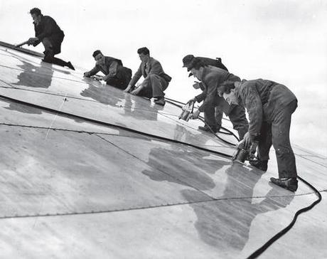 Workmen working on Dome of Discovery