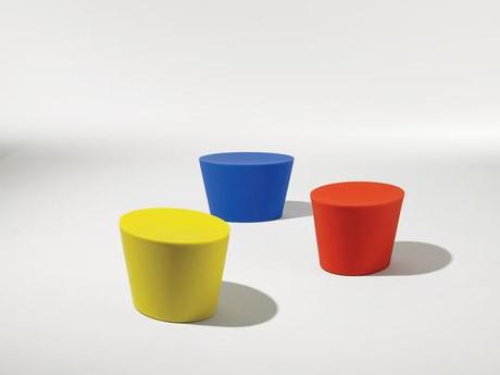 Multi-colored cylindrical outdoor seating.