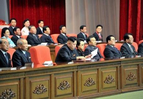 Kim Jong Un (3rd L) sits on the platform (rostrum) during the national meeting of light industry workers in Pyongyang on 18 March 2013.  Also on the platform are Kim Ki Nam (L), Choe Yong Rim (2nd L), Kim Kyong Hui (4th L) and Tae Jong Su (5th L) (Photo: Rodong Sinmun)