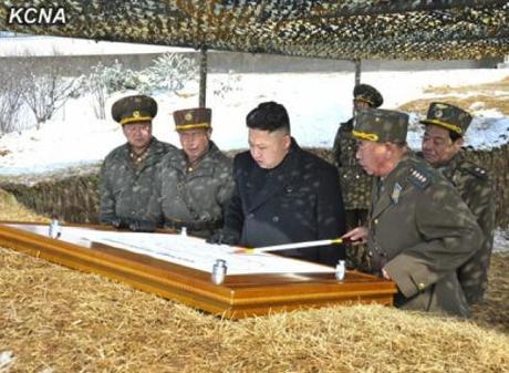 Gen. Ri Pyong Chol (R), commander of the KPA Air and Anti-Air Forces, briefs Kim Jong Un (2nd R) about live fire anti-aircraft drills (Photo: KCNA)