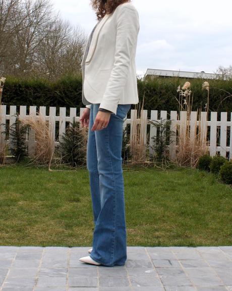 The flare jeans and the white wedge shoes