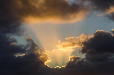 sunshine through hole in clouds