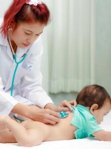 Female Doctor Checking Baby