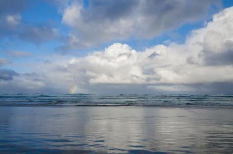 rainbow over ocean at discovery bay