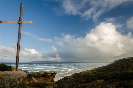 cross on hill overlooking discovery bay