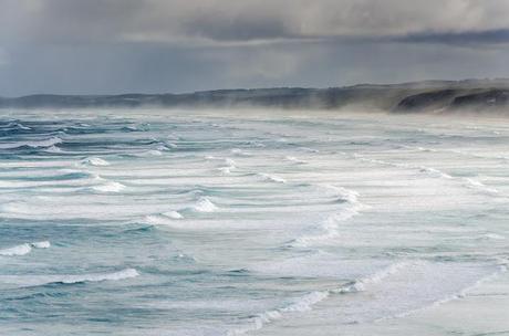 mist from sea over cliffs