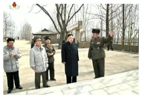 Kim Jong Un is briefed on a historical monument marking a 2003 visit by his father Kim Jong Il to the command element of KPA Unit #1973.  Also seen in attendance is Hwang Pyong So (L) and VMar Choe Ryong Hae (2nd L) (Photo: KCTV screengrabs) 