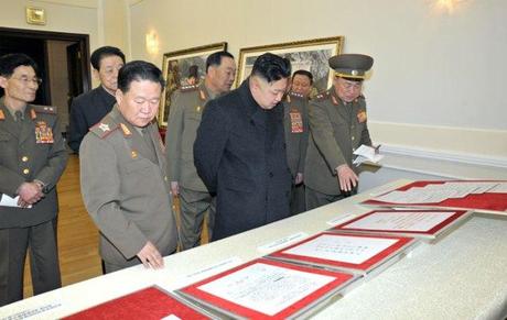 Kim Jong Un (2nd L, front row) examines documents earmarked for display at the reconstructed Victorious Fatherland War (Korean War) Museum on 24 March 2013.  Also in attendance is VMar Choe Ryong Hae (L, front) and Kim Kyong  Ok (2nd L, rear) (Photo: Rodong Sinmun)